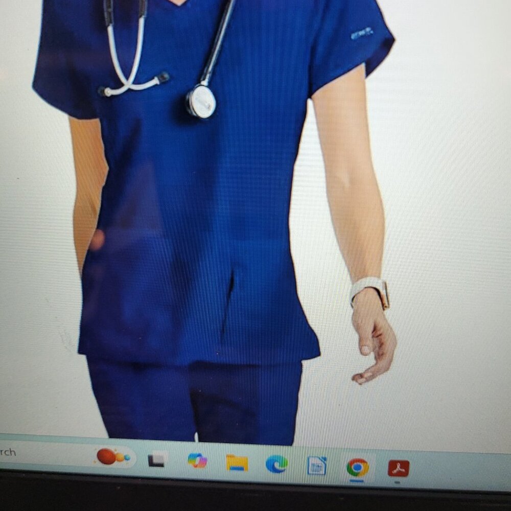 Brand new without tags Grey's Anatomy Navy medium scrub top. Super comfortable.